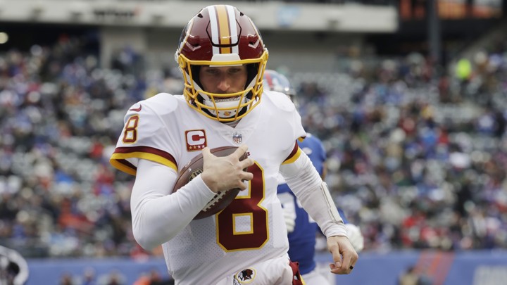 Washington Redskins quarterback Kirk Cousins rushes for a touchdown