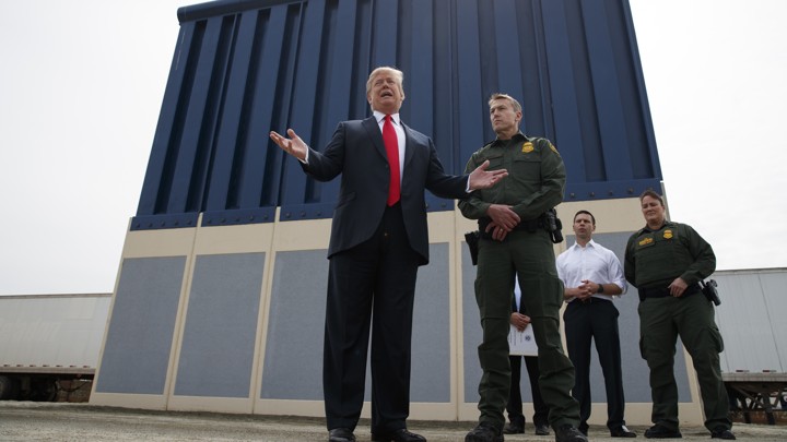 Trump reviews border wall prototypes