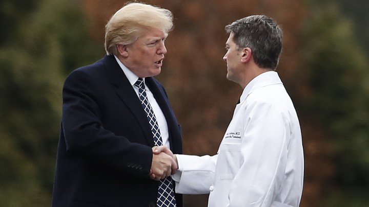Donald Trump shakes Ronny Jackson's hand