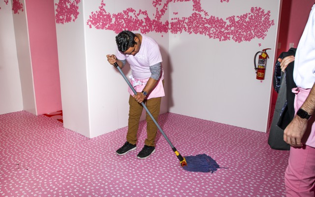 Museum of Ice Cream employee mopping the floor