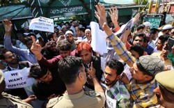 Protesters shouting at policemen