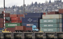 Cargo containers stacked at the Port of Seattle in April