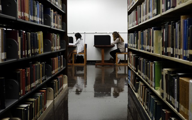 Students study in a library. 