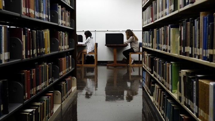 Students study in a library.