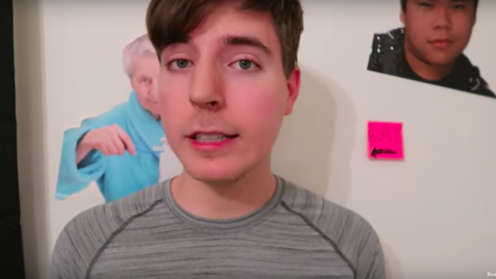 Youtuber Mr Beast S History Of Homophobic Comments The Atlantic - a boy looking into a camera with posters on the wall behind him mrbeast youtube