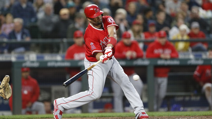 Los Angeles Angels first baseman Albert Pujols (5) connects on his 3,000th career hit against the Seattle Mariners during the fifth inning at Safeco Field