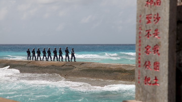 Chinese Navy sailors patrol the disputed Spratly Islands