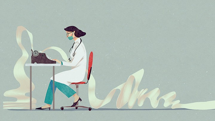 A woman sitting at a typewriter