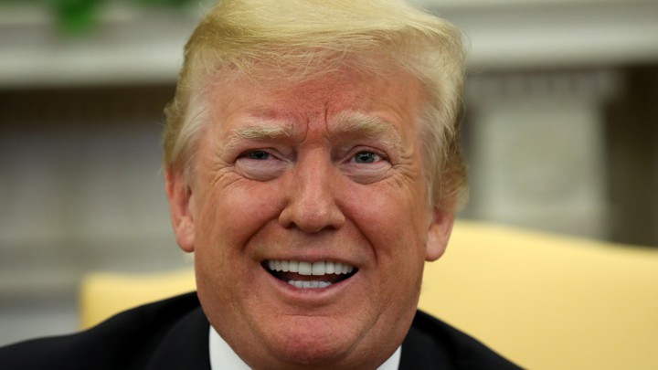 President Trump reacts as he welcomes South Korea's President Moon Jae In in the Oval Office on May 22, 2018.