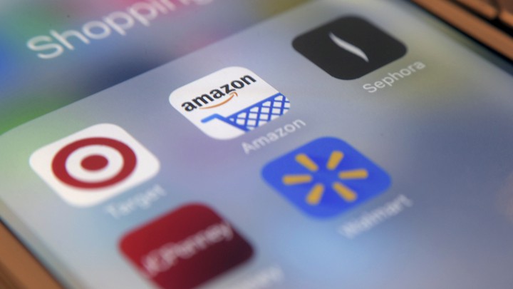 A close-up of the Amazon app, among other apps, on a phone screen