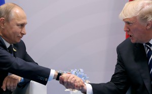 U.S. President Donald Trump shakes hands with Russian President Vladimir Putin during the their bilateral meeting at the G20 summit in Hamburg, Germany, July 7, 2017. 