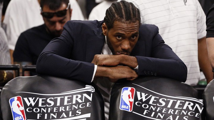 Kawhi Leonard watches from the sidelines at the 2017 Western Conference Finals