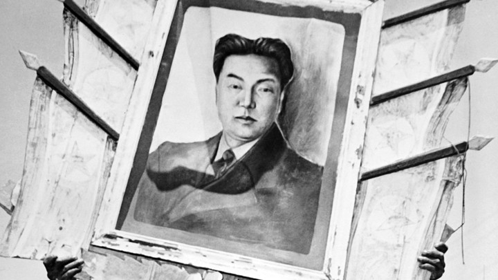 A framed portrait of Kim Il-Sung, North Korea's first Supreme Leader, in 1952.