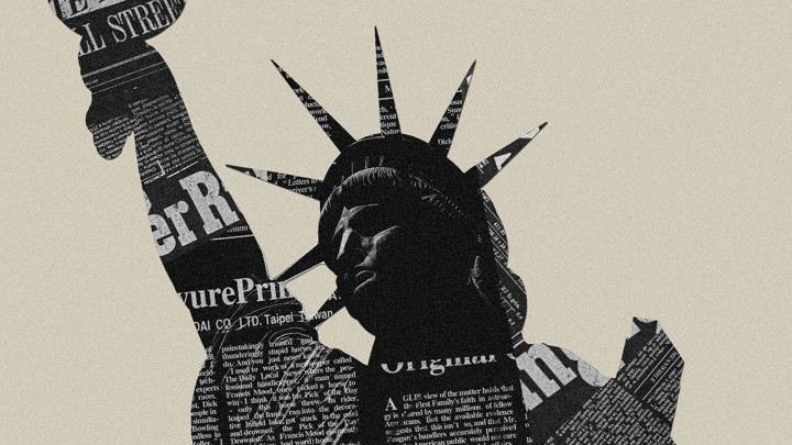 Picture of newspaper on top of the Statue of Liberty