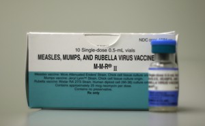 A dose of a measles, mumps, and rubella vaccine