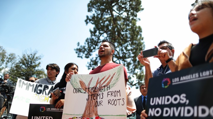 Protesters demonstrate against the termination of DACA.