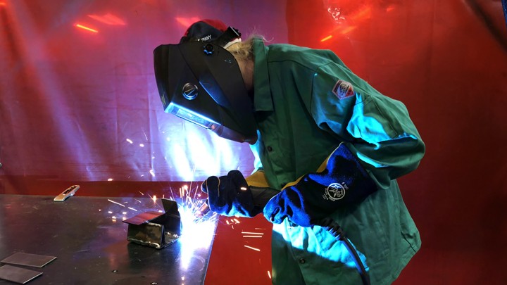 A woman welding