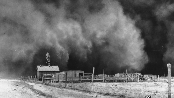 A ranch in Boise City, Oklahoma, is about to be encompassed by a gulf cloud in April 1935.