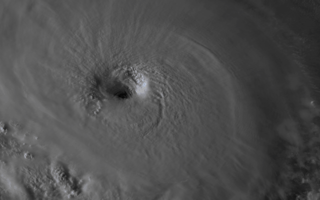A black-and-white animation of the churning eye wall of Hurricane Florence, surrounded by convective clouds