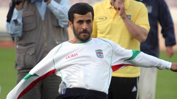 Mahmoud Ahmadinejad practices the other kind of football with the Iranian national team in 2006