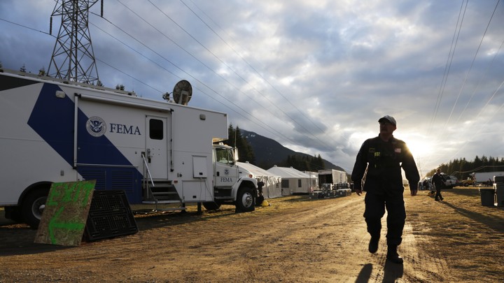 A FEMA worker helping with a mudslide-recovery effort in Darrington, Washington, in March 2014.