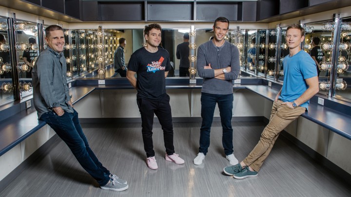 Dan Pfeiffer, Jon Lovett, Jon Favreau, and Tommy Vietor pose for a portrait