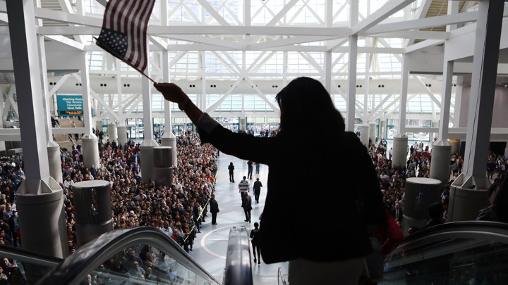 Thousands of people become naturalized citizens at this ceremony in Los Angeles in March.