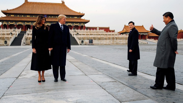 Donald and Melania Trump visit the Forbidden City in Beijing with Xi Jinping in 2017.