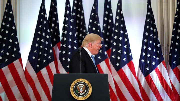 Trump leaves his podium after a press conference during the UN General Assembly.