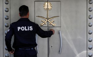 A Turkish police officer stands guard at Saudi Arabia's consulate in Istanbul.
