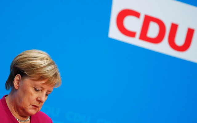 Angela Merkel attends a news conference after learning the results of the election in Hesse, Germany.
