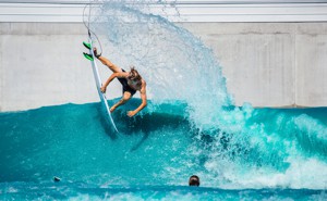 A surfer in a wave pool at Waco, Texas