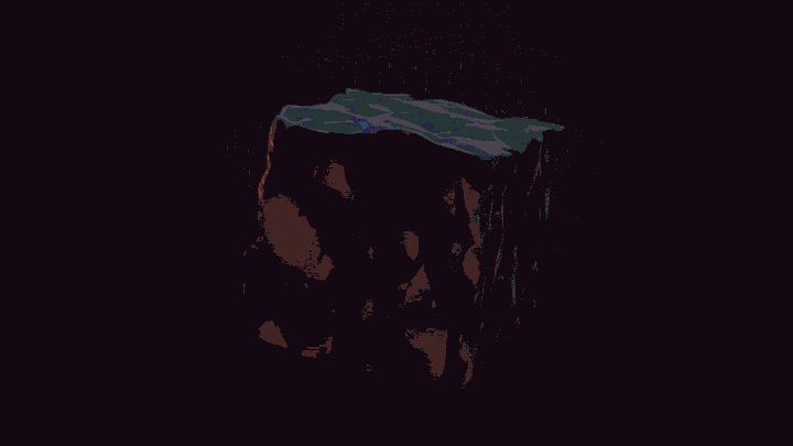 A flash of light dissipates through a rough cube of metallic material.