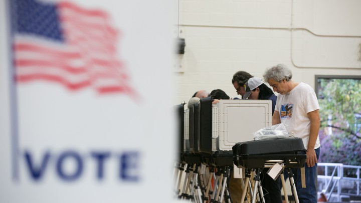 Voters cast their ballots at a polling station