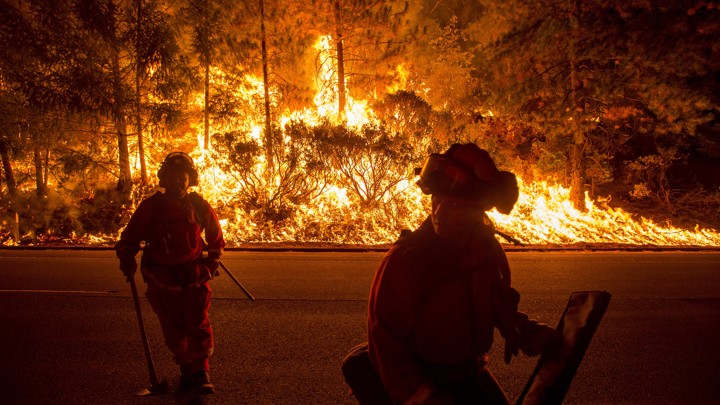 Firefighters battle the King Fire near Fresh Pond, California, in September 2014.