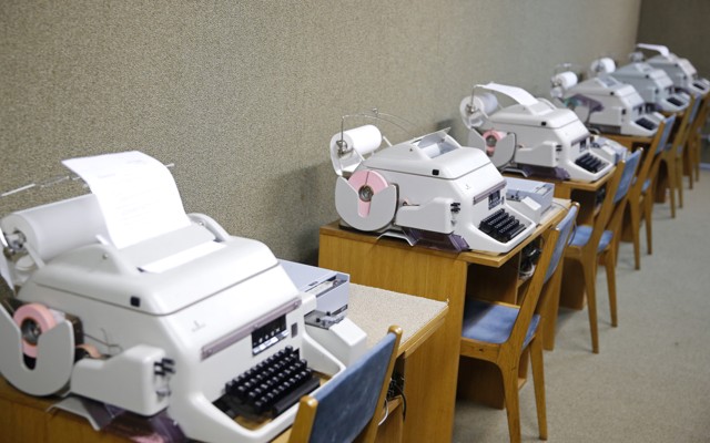 A row of fax machines