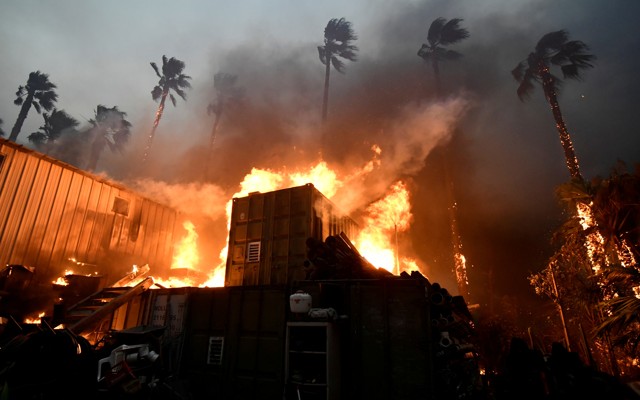 A home is engulfed in flames during the Woolsey Fire in Malibu, California on November 9, 2018.