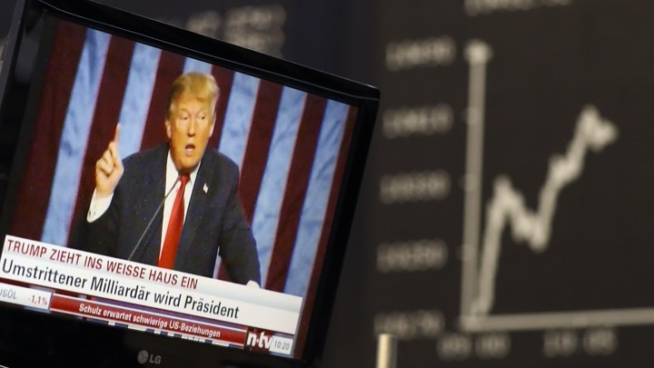 President Trump is pictured on a television screen in Frankfurt, Germany, onÂ November 9, 2016.