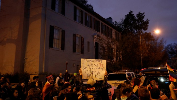 Protesters rally outside the home of Ivanka Trump on April 1, 2017.