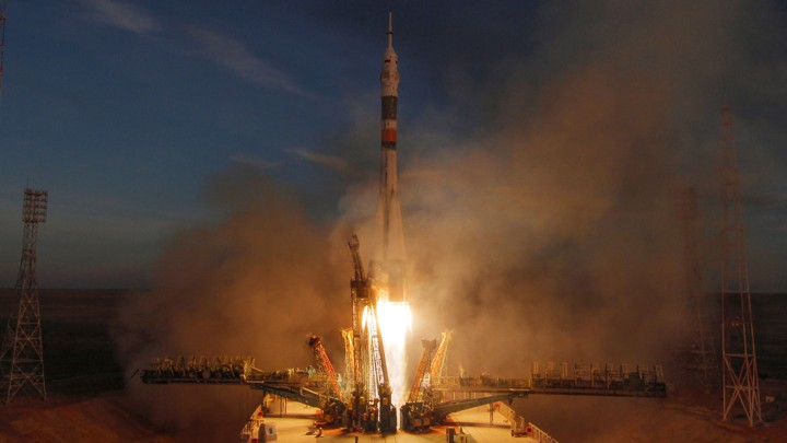 A rocket carrying a three-person crew launches to space from Kazakhstan.