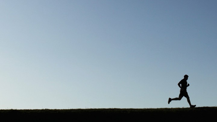 Silhouette of a man running
