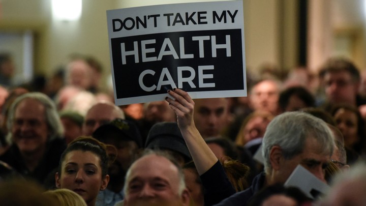 People demonstrate for the Affordable Care Act