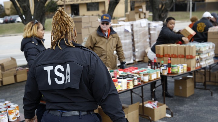 Princess Young, a Transportation Security Administration employee, visits a food pantry for furloughed government workers last week in Baltimore.