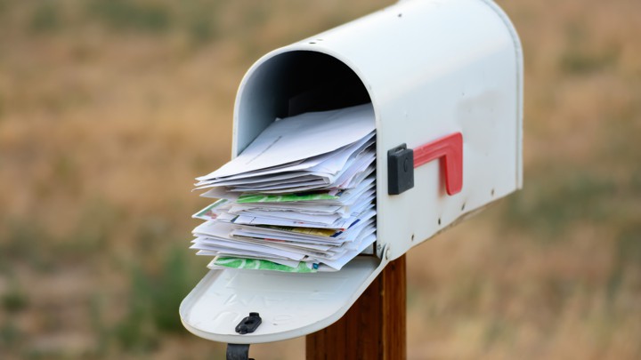 An overflowing mailbox