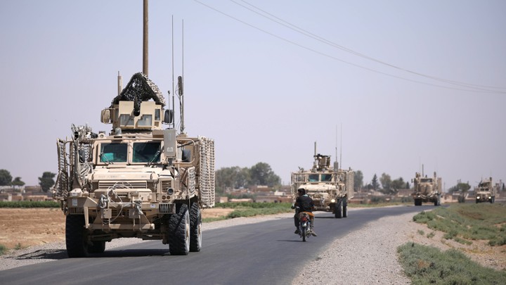 A U.S. military convoy in Raqqa, Syria