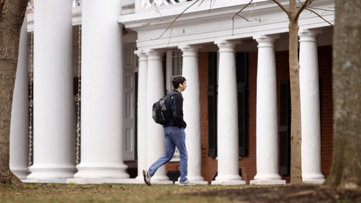 a student walks on campus