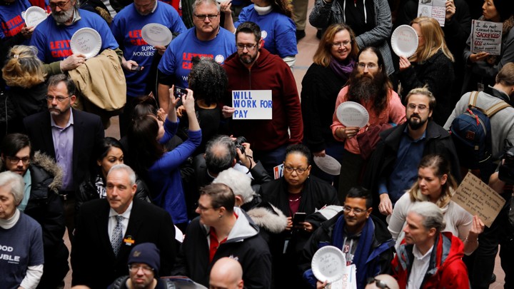 Union members and other demonstrators hold protest of partial U.S government shutdown in Washington