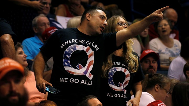 Why Conspiracy Videos Go Viral On Youtube The Atlantic - people at a donald trump rally in shirts promoting q a conspiracy theory involving the president leah millis reuters