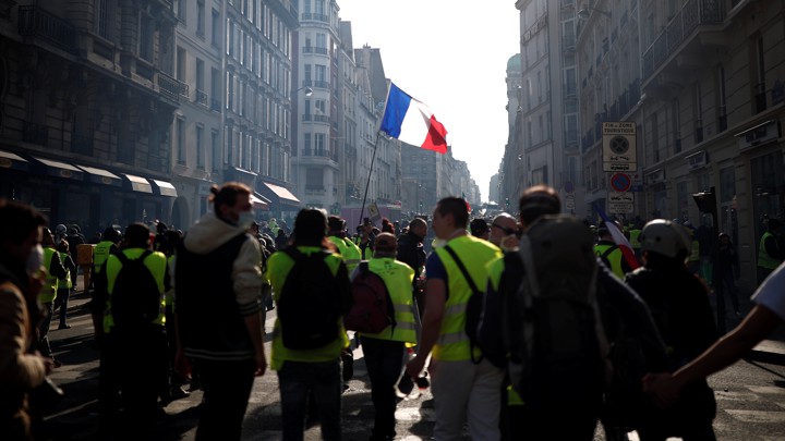 Yellow-vest protesters attend a demonstration in Paris on February 16.
