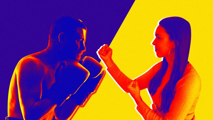 A man and woman face off in boxing stance